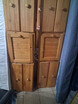 Twin wooden bed with drawers  and twin mattress  in good condition