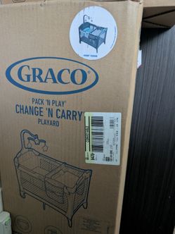 Change and playpen carry