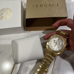 Gold Versace watch 