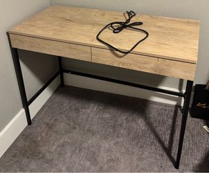 Desk with integrated power/charging