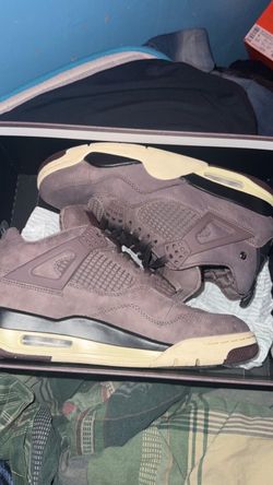 Nike Air Jordan 4 Retro SP x A Ma Maniére in the "Violet Ore" colorway, featuring a unique metallic pin on the collar and a quilted interior.