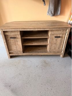Corner wooden entertaining center