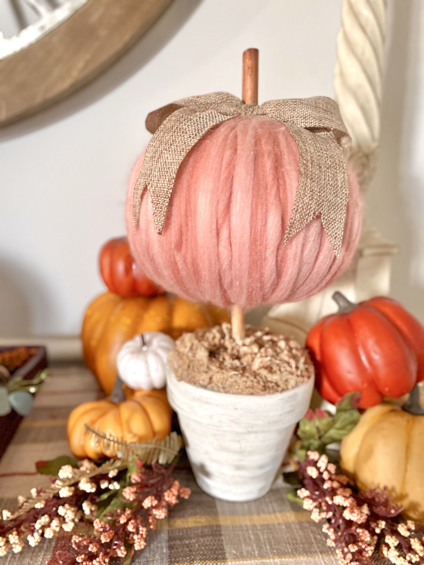 Peachy chunky yarn pumpkin topiary