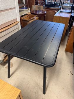 black aluminum rectangular outdoor dining table. - 54” x 31”