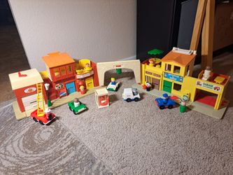 Vintage fisher price little people village