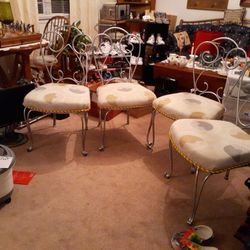 4 BEAUTIFUL DINING  WROUGHT  IRON. PADDED. CHAIRS GOOD CONDITION $75.                  CHAIRS