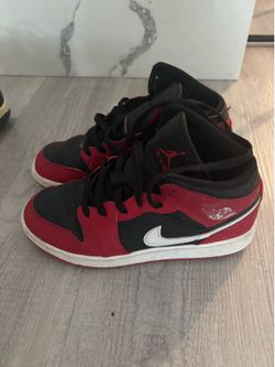 Boys size 6 air Jordan Nikes red and black