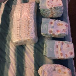 Size 2 Diapers, (74 Of Them)