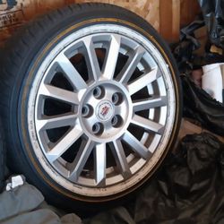 Cadillac Rims And Vouge Tires 
