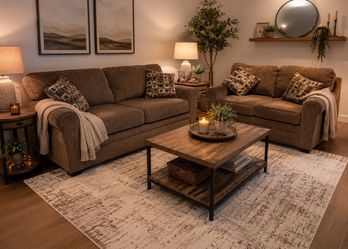 Matching brown couch and loveseat. With throw pillows. Good condition!