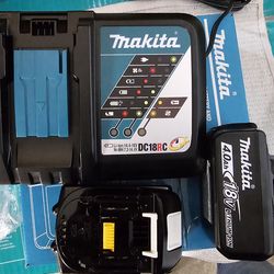 Makita 18v lxt 4ah batteries and charger