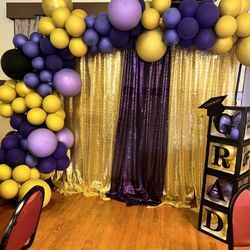 Graduation Backdrop With A Balloon Garland 