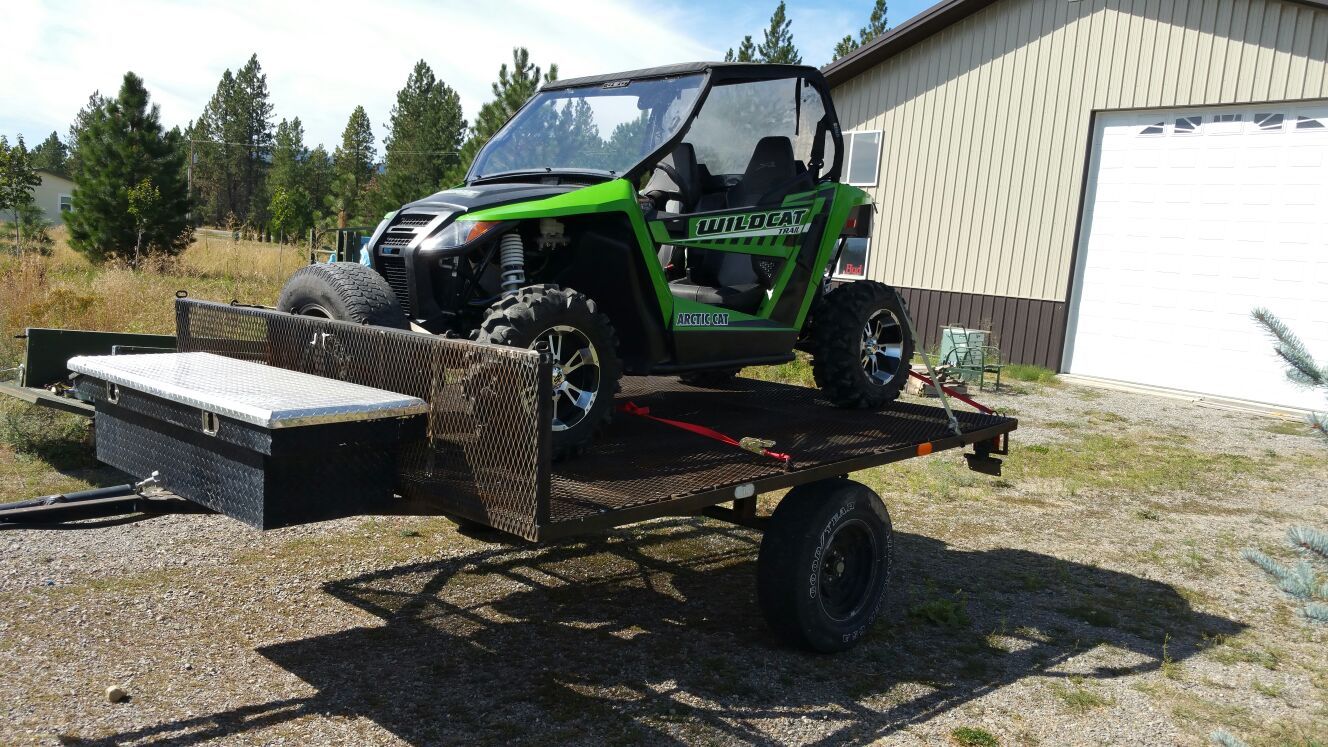 8x10 utility trailer with 3500lb axle stake pockets and welded rings all along.