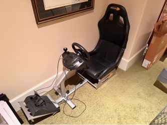 Gaming Chair with Wheel and Pedals was used on XBOX 360