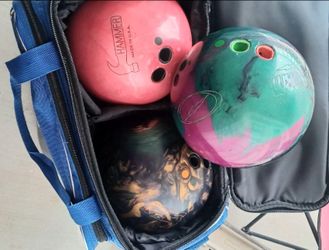 3 bowling balls with the carriers  size 16