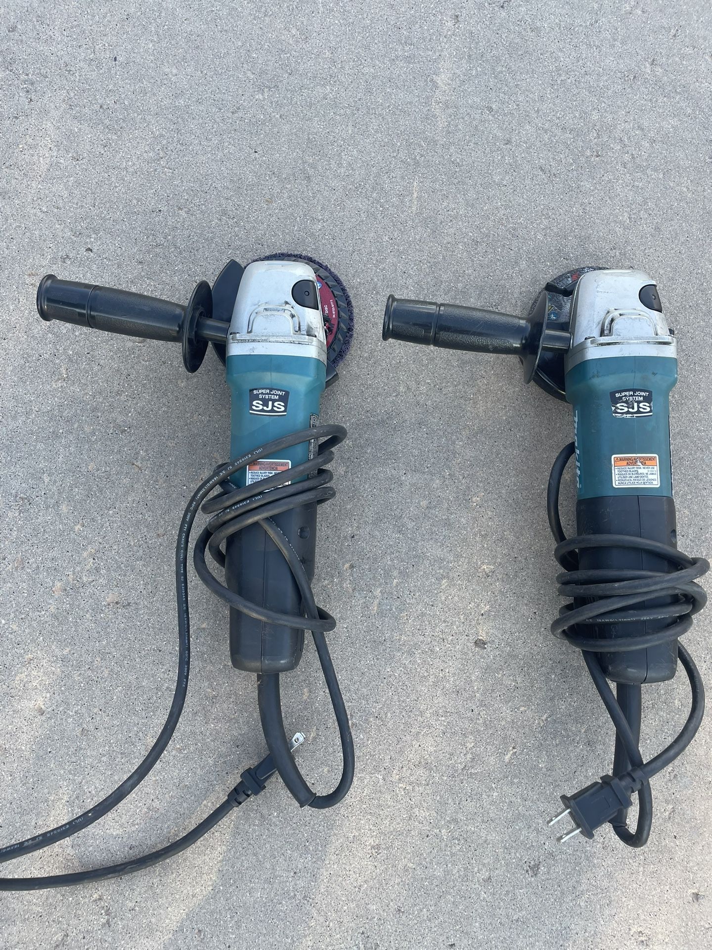 Two Makita Right Angle Grinders