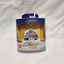 Hot Wheels “Holiday Series IV – Santa’s Stocker”