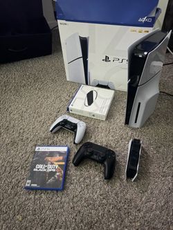 Ps5 2 controllers and game with charger