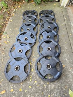 12x Body Solid Rubber Coated Olympic Weight Plates (slight damage)