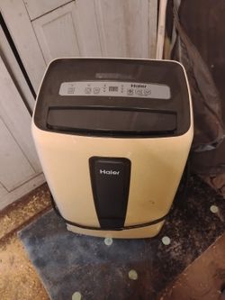 Haier Portable Air Conditioner And Dehumidifier 12000 Btu