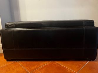 Black leather storage Ottoman
