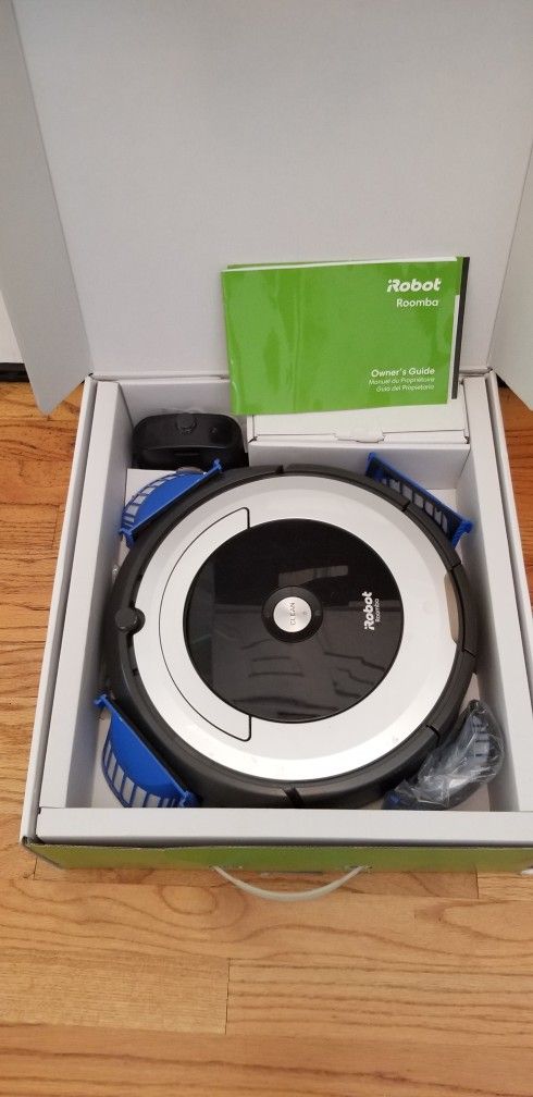 Brand NEW ROBOT ROOBA VACUUM WITH AMAZING POWER SUCTION  IN THE BOX
