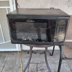 Microwave.   Kinda Faded But Works Perfectly Fine