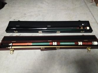 2 professional pool sticks..used one of them to win tournament
