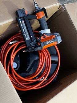RIDGID 6 Gal. 150 PSI Portable Electric Oil-Free Jobsite Pancake Air Compressor with 25 ft. Air Hose
