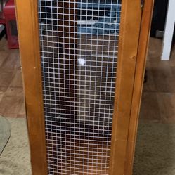 Curious Cabinet With Wire On The Sides