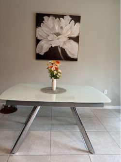 Dining table with frosted white glass top