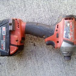 Milwaukee M18 1/4 " Impact Driver And 5 AH battery