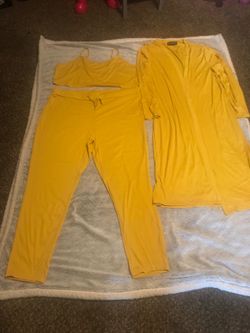 A three piece set waist pants and open front of worship