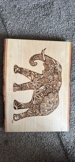 Carved Elephant Art on Natural Wood