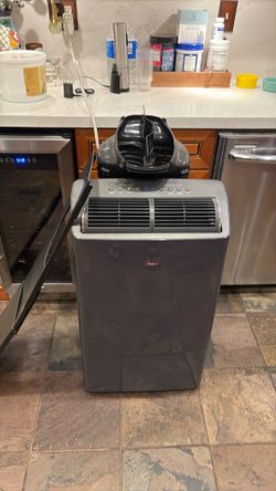 Air conditioner 280$ $ firm cash only will cool a large area wi fi smart ac