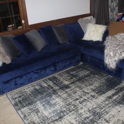 Blue tufted velvet l shaped chaise couch