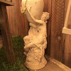 Yard art Approx 28” tall Holds a small 3” pot