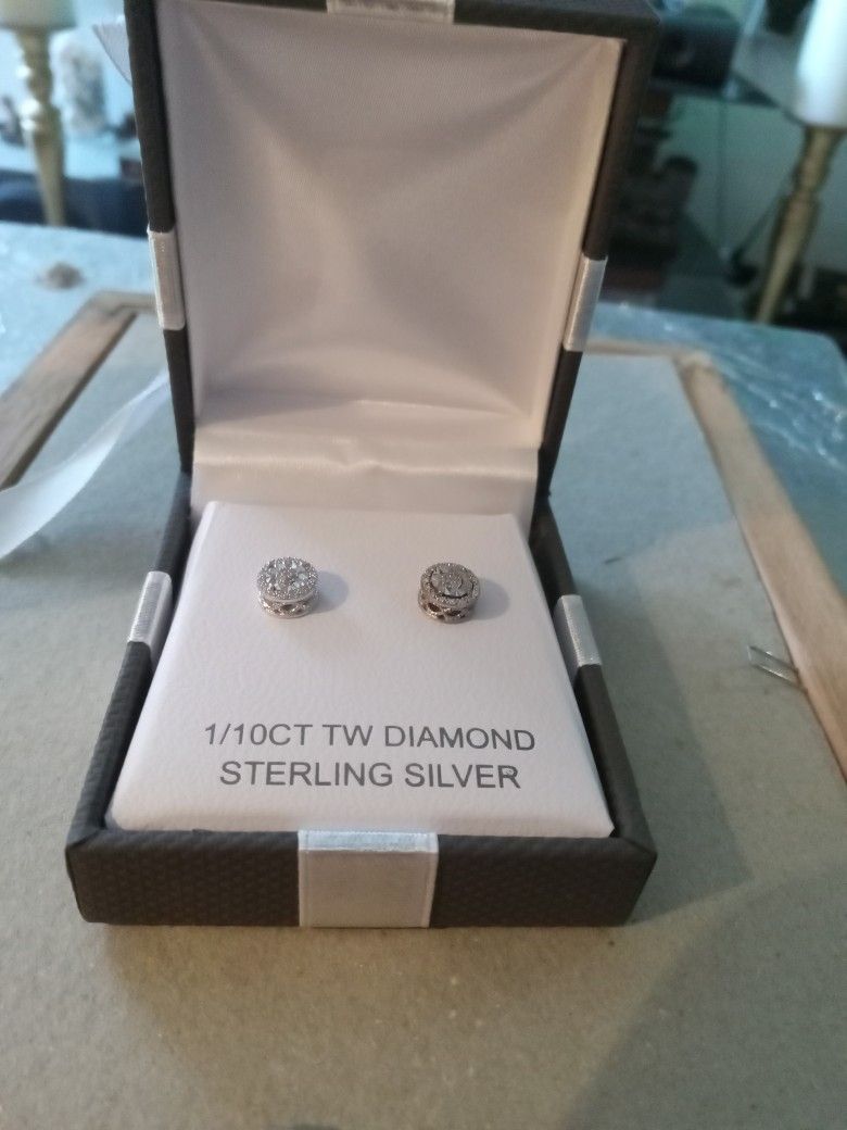 Silver earrings with diamonds. God damn For 200 Selling For $100