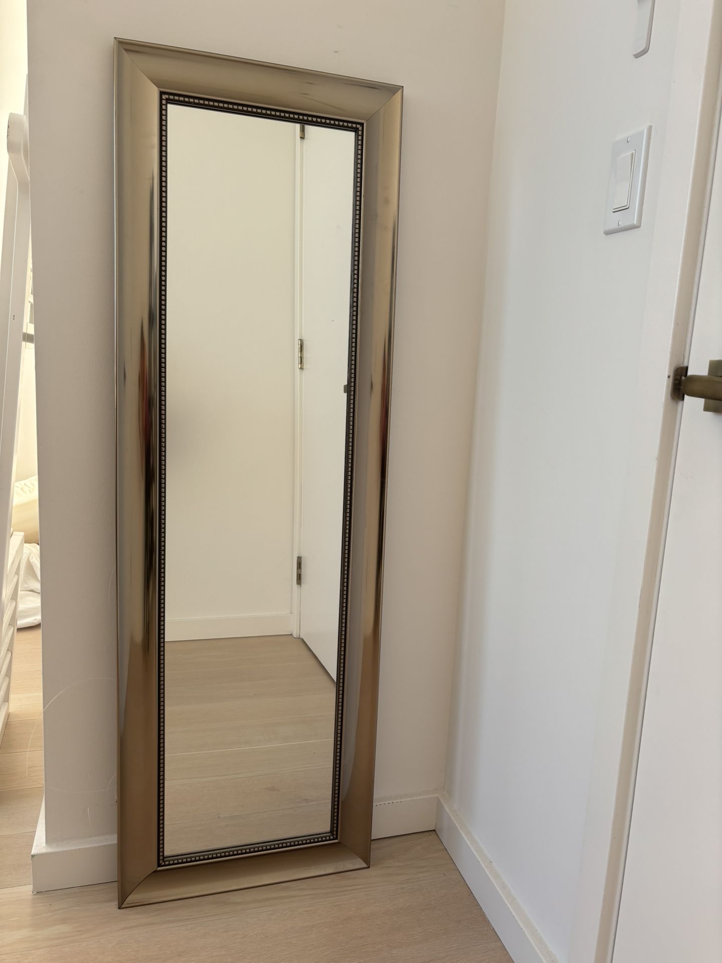 Bronze framed standing mirror 17 1/2 inches wide by 52 1/2 inches tall