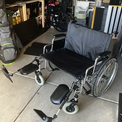 New Heavy Duty 700 Pound Weight Limit Wheelchair With 28 Inch Wide Seat And Leg Elevating Footrests $95