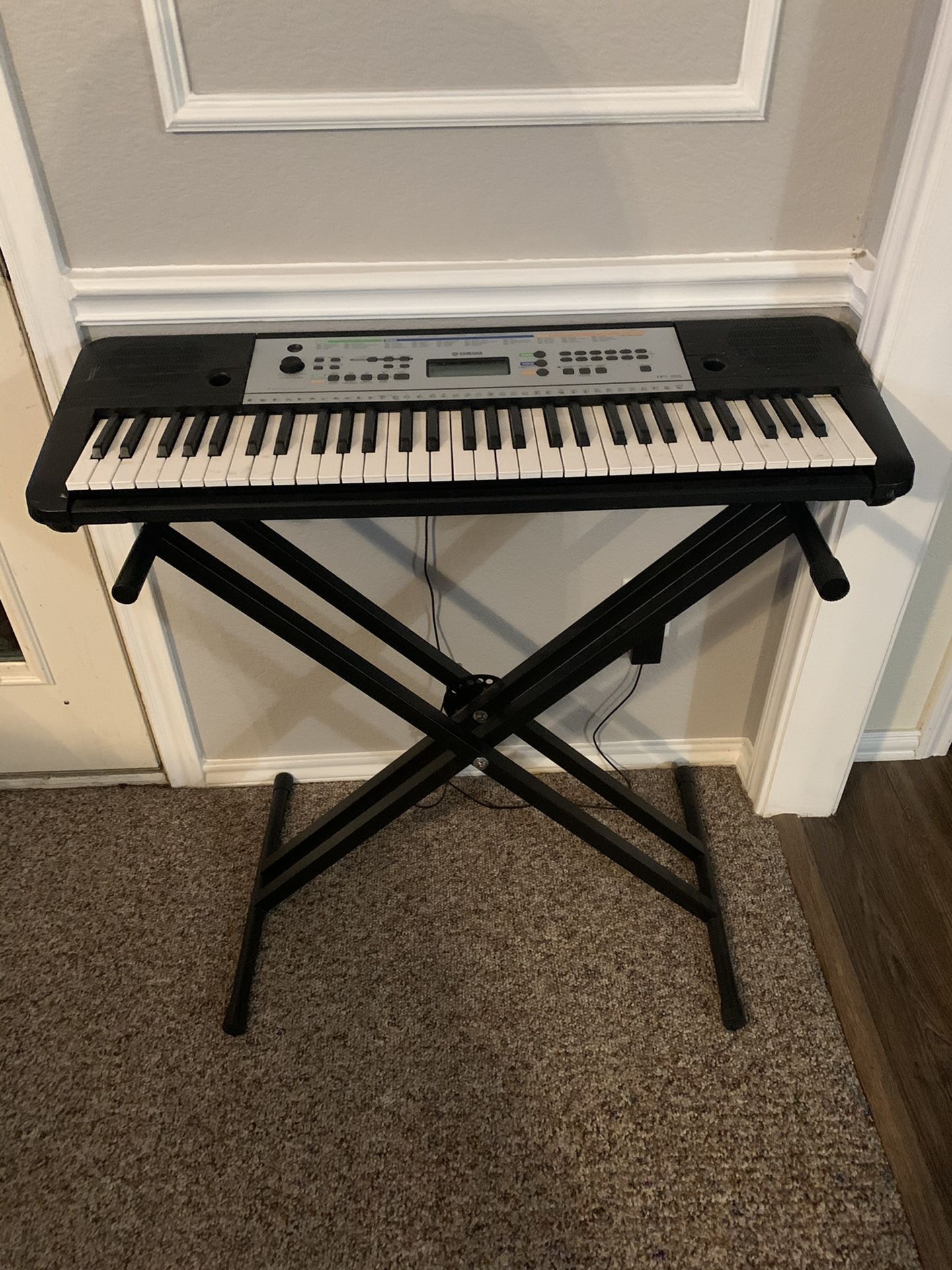 Yamaha keyboard and stand