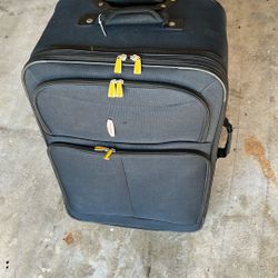 Luggage approximately 19 inches wide 31 inches high $20