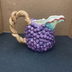 Grape Pitcher . Item No 557 (Shopgoodwill)