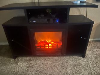 Entertainment center with fireplace