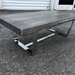 Grey Rustic Wood Top Modern Chrome Base Coffee Table! Good condition overall! 52x26x17in