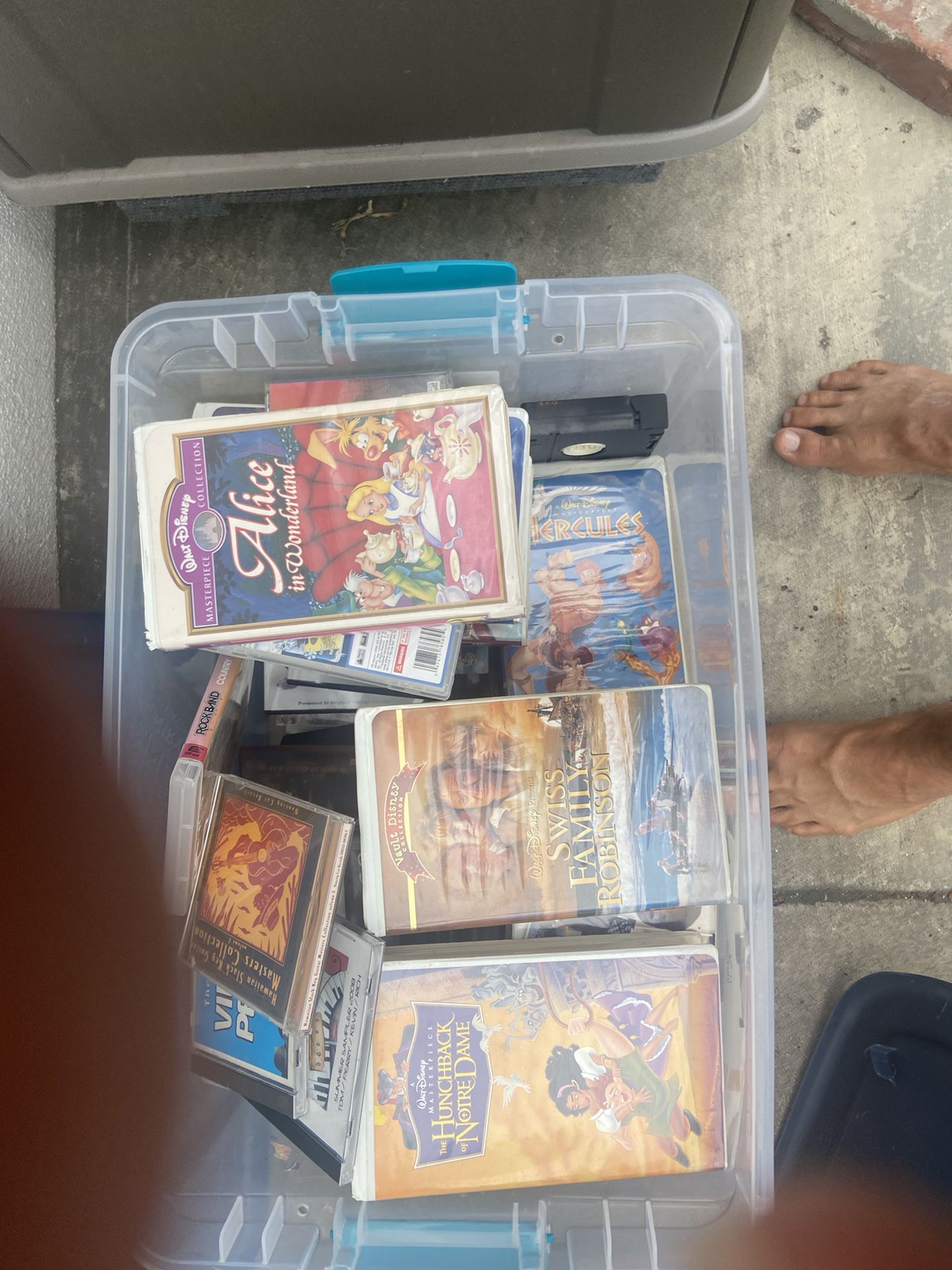 VHS tapes, DVDs, Blu-ray, PlayStation games rock band games