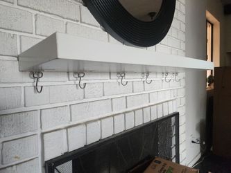 White Floating Shelf with Metal Hooks