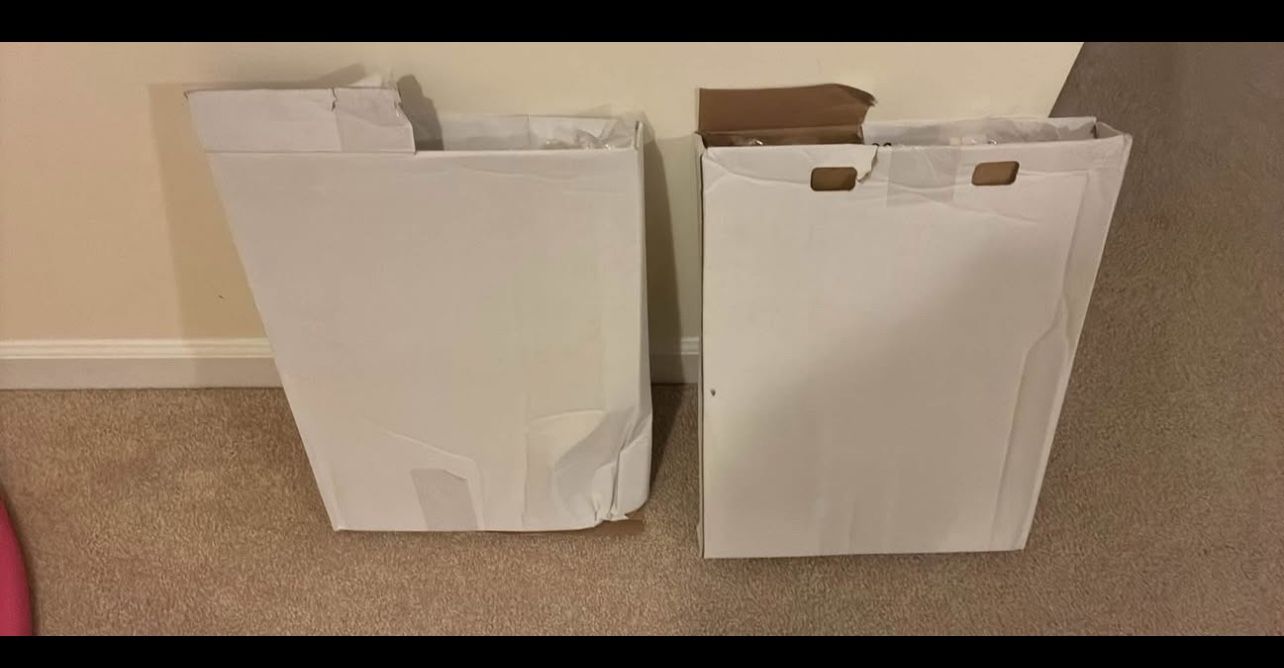 Two White Toilet Seats