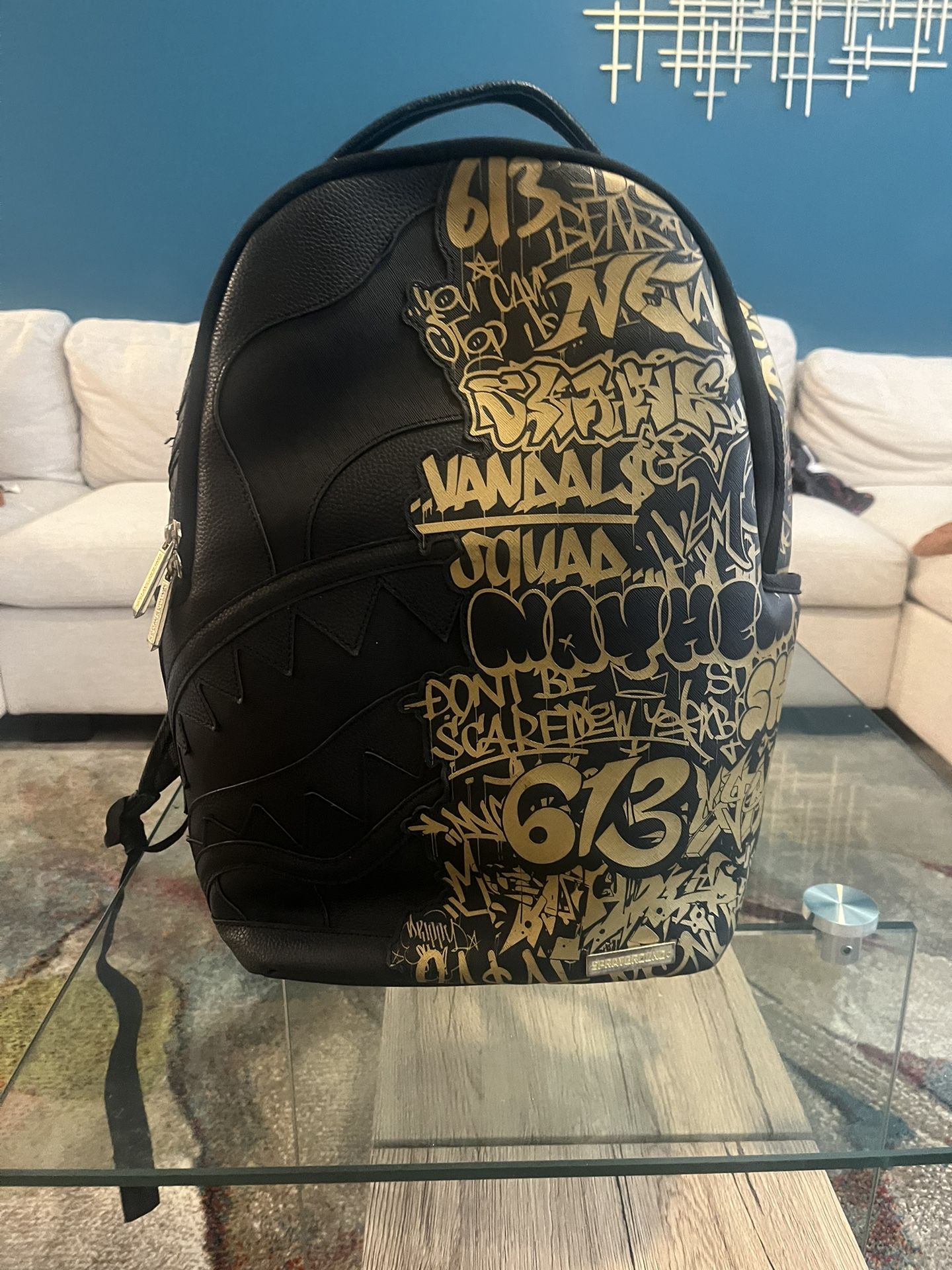 Black and Gold Sprayground Backpack