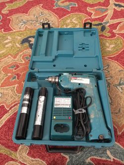 Makita 3/8” Drill complete set with two batteries